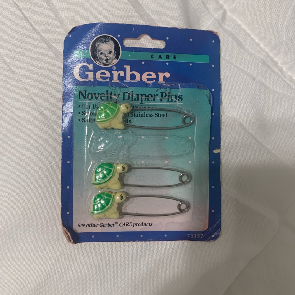 Gerber vintage diaper pins. Turtles. On original card. One missing.